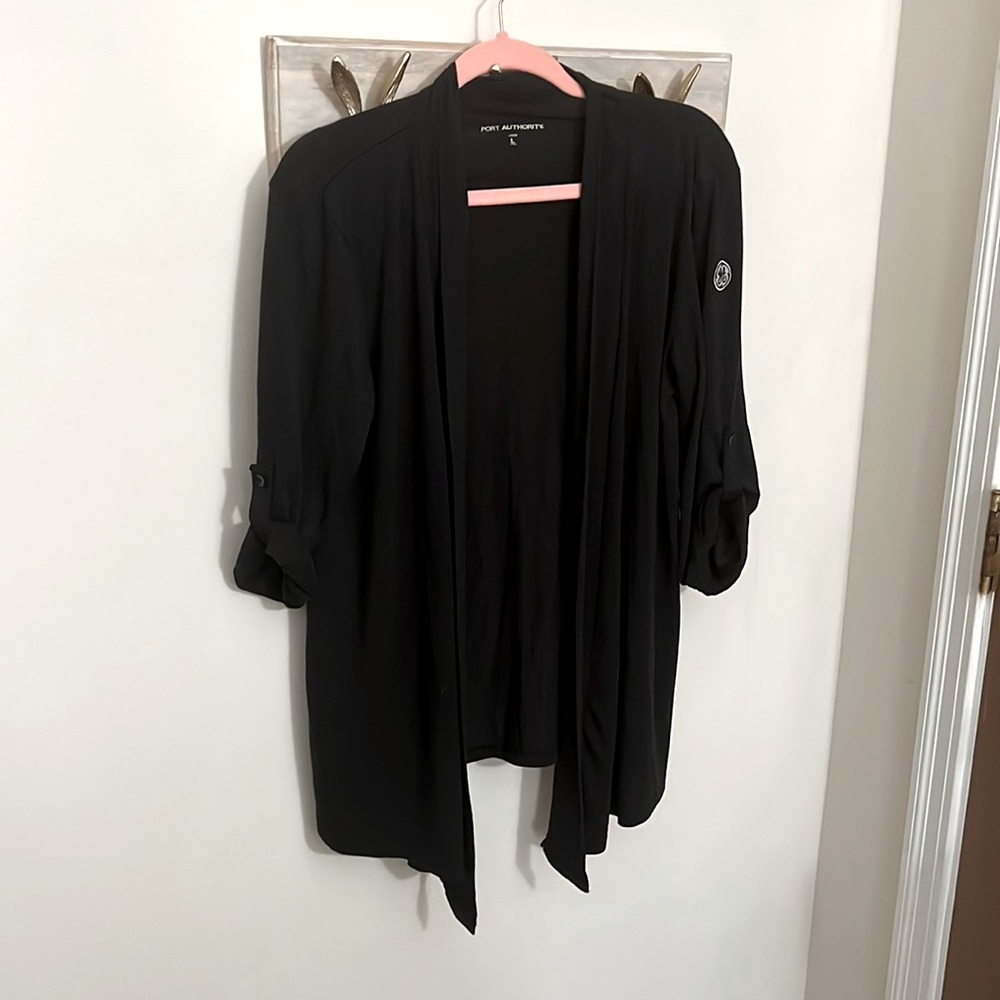 GE logo on cardigan